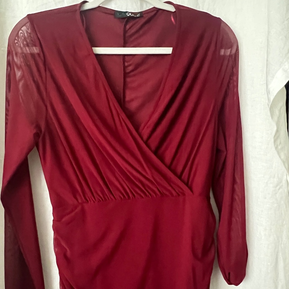 Burgundy plunging neckline and lace sleeve